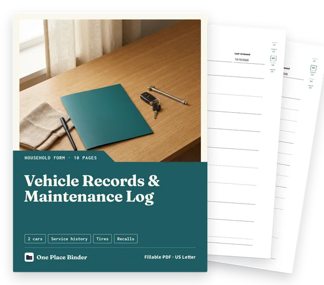 Vehicle Records & Maintenance Log cover with two filled sample pages behind it